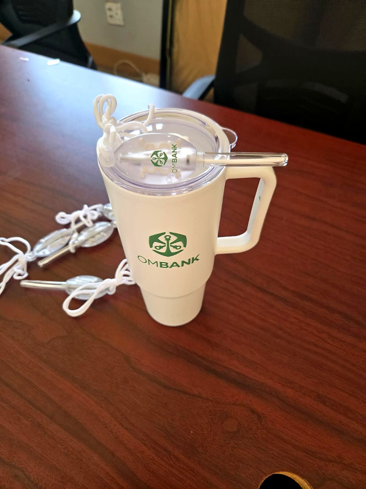 OMBANK branded tumbler